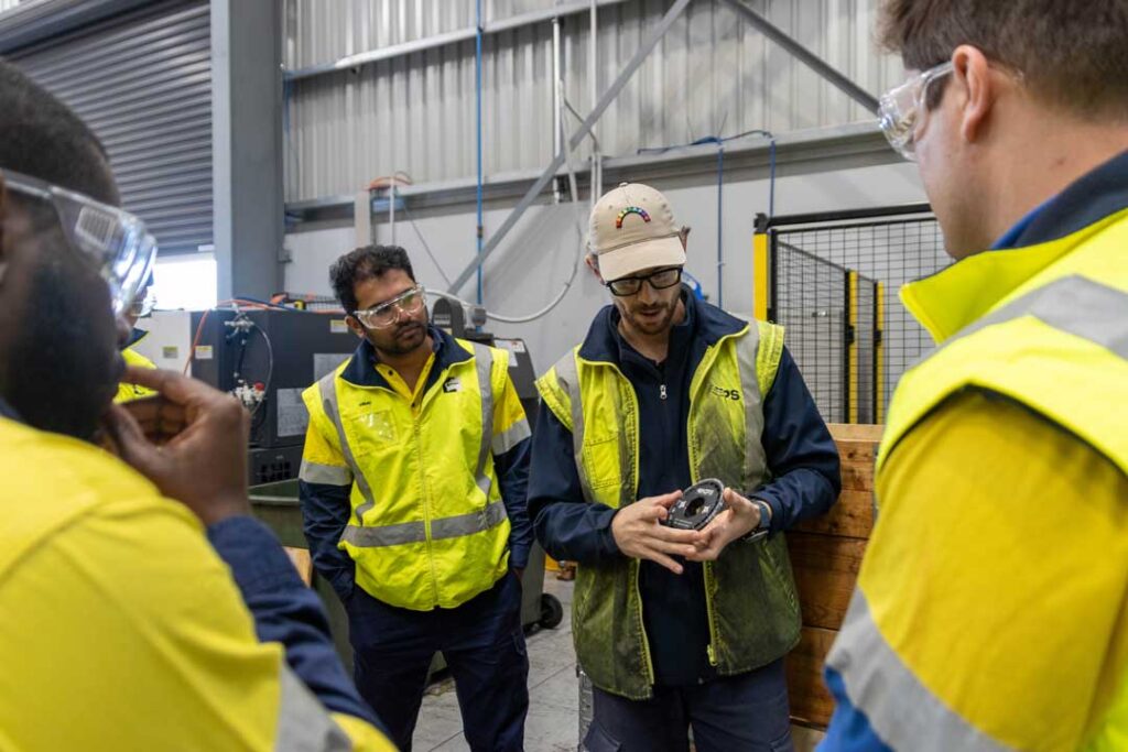 Roy Hill graduates learning the intricacies of conveyor belting, one of the crucial components of any mineral processing strategy